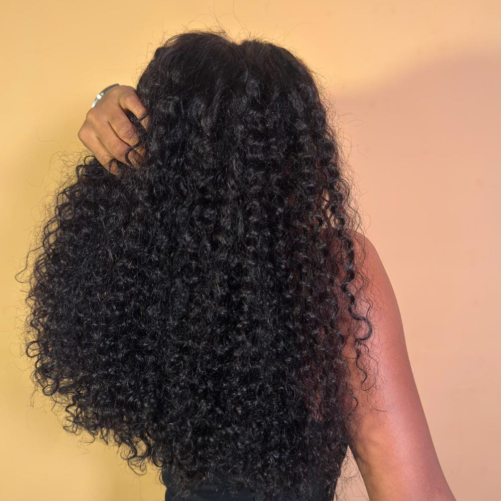 22 inch bouncy curl glueless human hair wig rear view